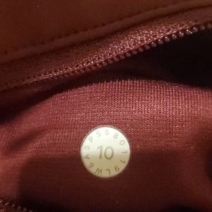 Maroon and orange Lululemon leggings